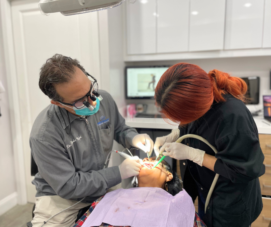 Dr Richard Nejat of Advanced Periodontics & Implant Dentistry Bronxville with a patient